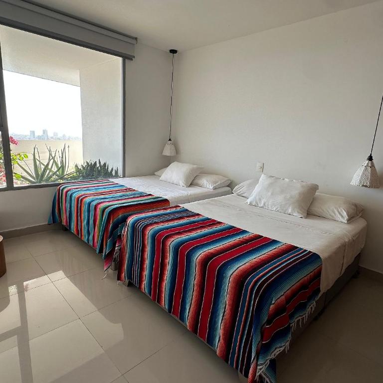 Amplios Aptos de Lujo Frente a la Playa a 5 Minutos del Centro y del Aeropuerto, en Edificio con Piscina, Jacuzzi, Sauna, Gimnasio, Turco y Seguridad las 24 hs. - Apartamento de 2 dormitorios con terraza y vistas al mar - 25