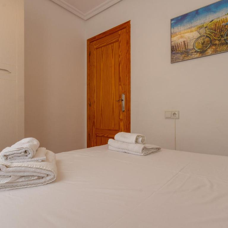 Apartamento en Arenales con Piscina y Terraza Soleada - Apartamento de 3 dormitorios - 32