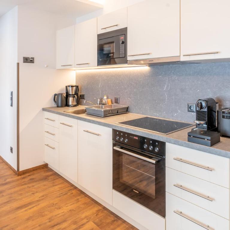 Alpenresidenz Hotel Gell - Apartment mit 1 Schlafzimmer und Balkon - 1