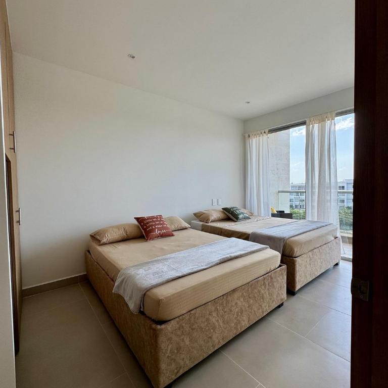 U-GO Baia Kristal: Modern Oasis in Cartagena - Deluxe Two-Bedroom Apartment with Garden View - 43