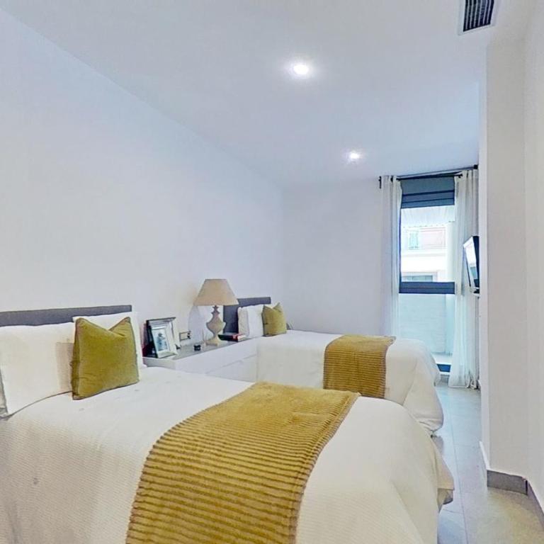 Panta baja a 50 m de la playa - Three-Bedroom Apartment - 11