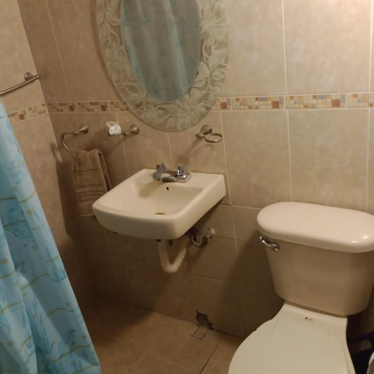 Departamento el REPOSO - Three-Bedroom Apartment - 16