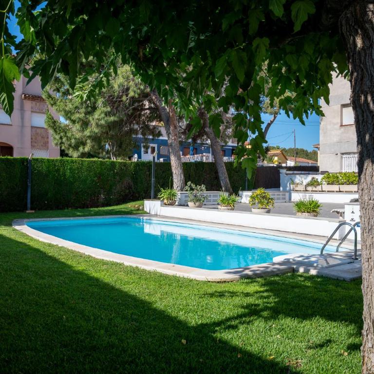 AT005 Planta baja con piscina, airco, parking, playa a 600m - Apartamento - 1