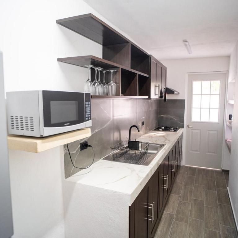 Encanto y Confort Acogedora Casita en Mérida Casa Puma - Casa de 2 dormitorios - 77