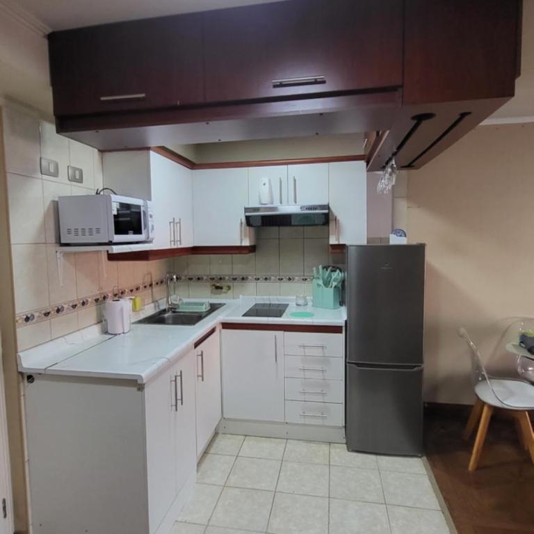 Iquique - Departamento ubicado frente a la Playa - Incluye Estacionamiento, Puesta de Sol y Mar - Reserva mínima 2 Noches - Apartamento de 1 dormitorio - 12