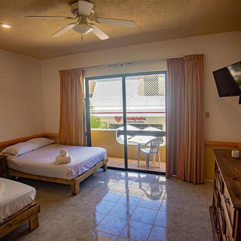 Hotel Vista Caribe Boutique 1 - Habitación Cuádruple Deluxe - 9
