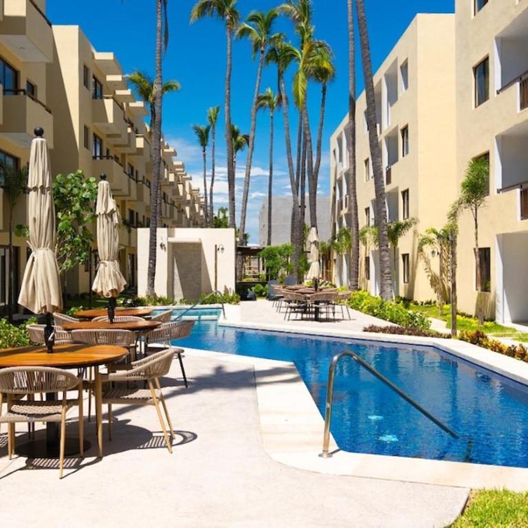 Nuevo departamento con acceso frente a la playa, jacuzzi y alberca climatizada - One-Bedroom Apartment - 58