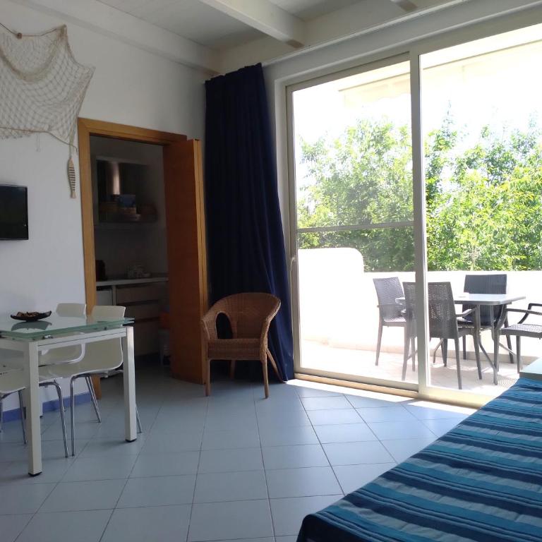 Residence Orsa Minore - Camera Familiare (2 Adulti e 2 Bambini) con Vista sul Giardino - 11