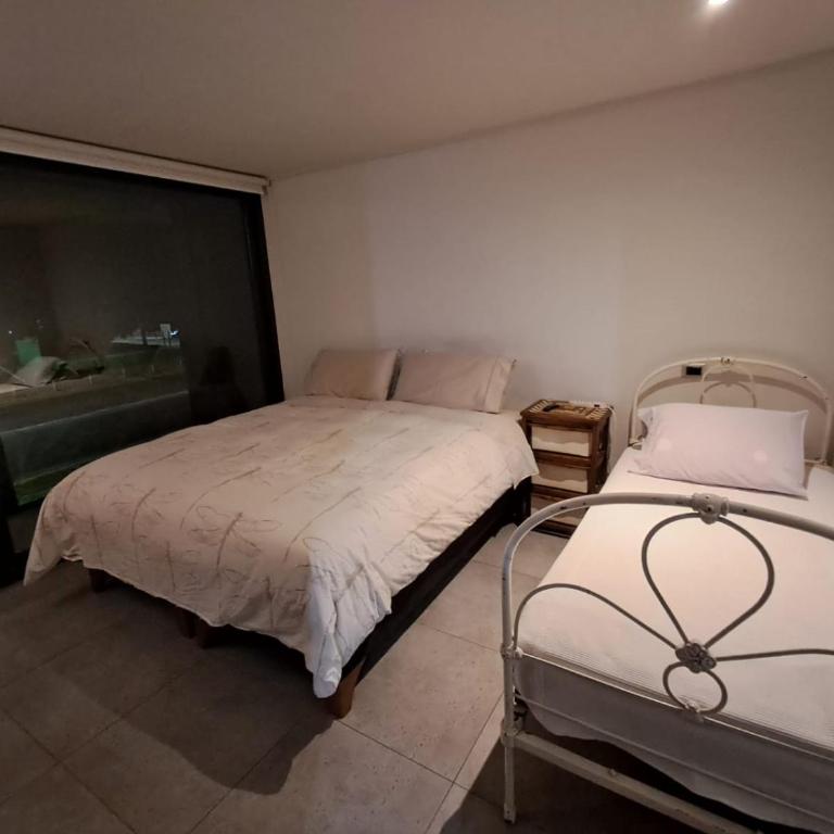 Dpto Av Las Condes lado Mall Sport - Apartamento de 2 dormitorios con terraza - 8