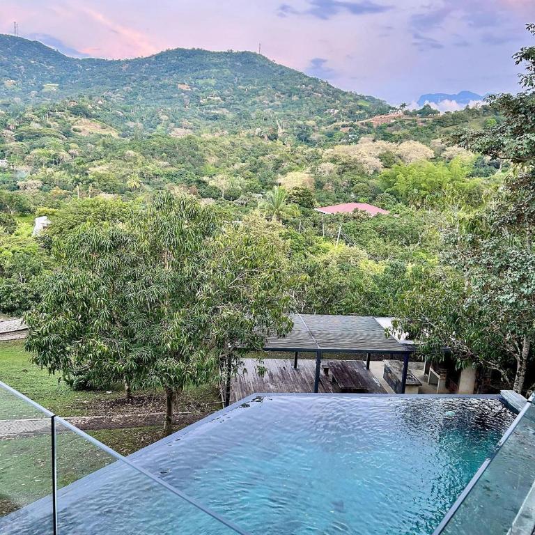 Descanso total en el mejor clima de Colombia - Villa - 37