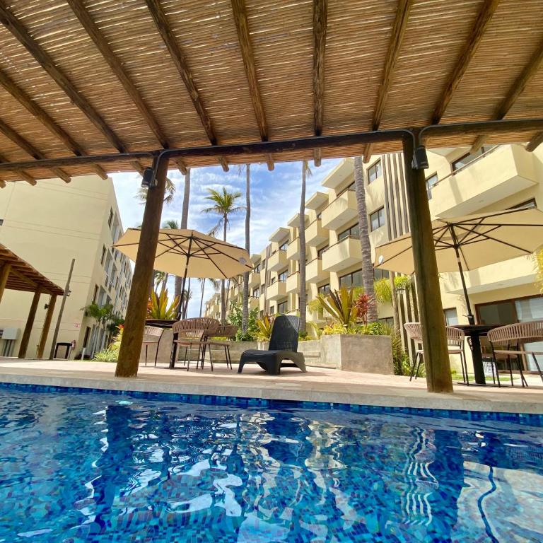 Nuevo departamento con acceso frente a la playa, jacuzzi y alberca climatizada - One-Bedroom Apartment - 40