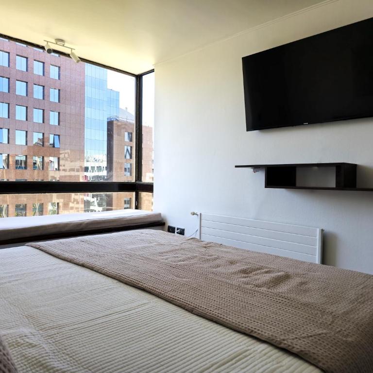 Amplio dpto a pasos del Costanera Center y MUT en Las Condes - Apartamento de 3 dormitorios - 12