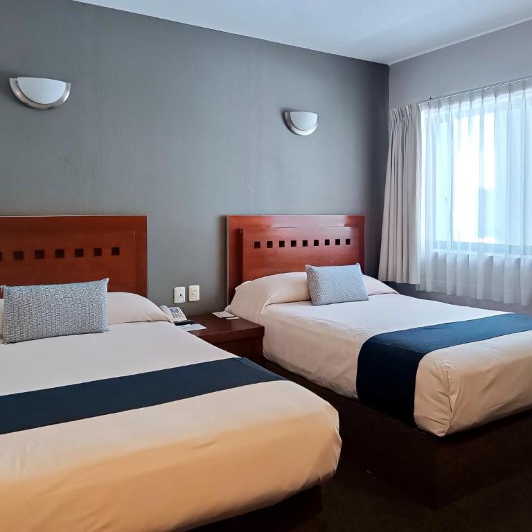 Hotel Panamerican - Habitación Doble Económica con 2 camas dobles - 5