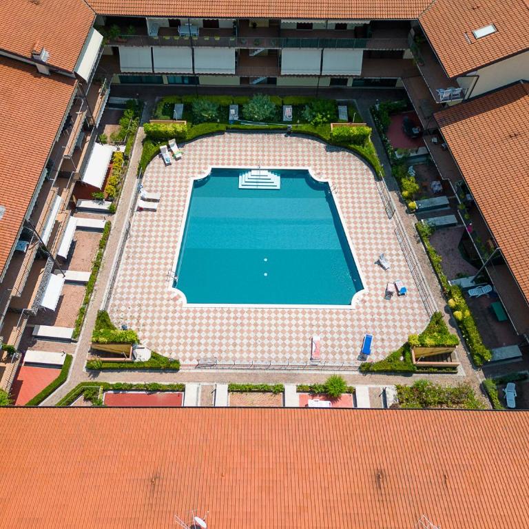 La casa di Monica con piscina e terrazza - Three-Bedroom Apartment with Balcony - 1
