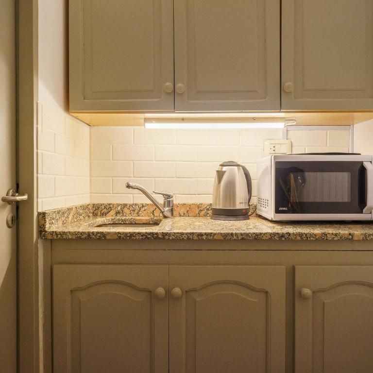 Complejo Espejo a pasos de Peatonal Sarmiento y Av San Martin - Apartamento - 10