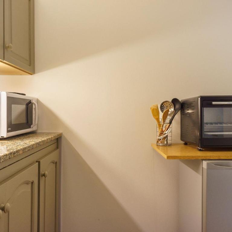 Complejo Espejo a pasos de Peatonal Sarmiento y Av San Martin - Apartamento - 12