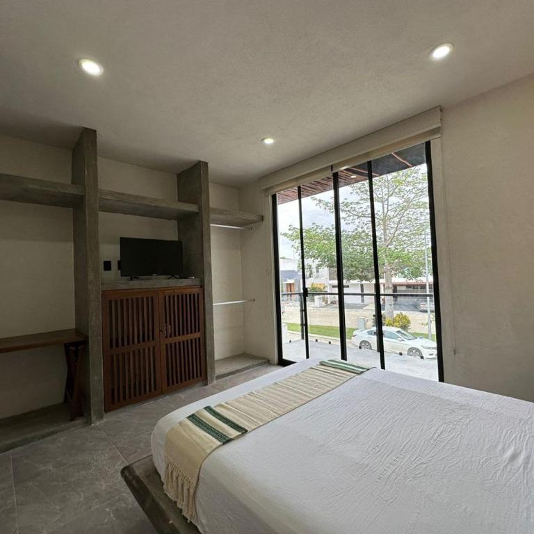 Residencia Cancún Alberca privada y 6 habitaciones - Casa - 49