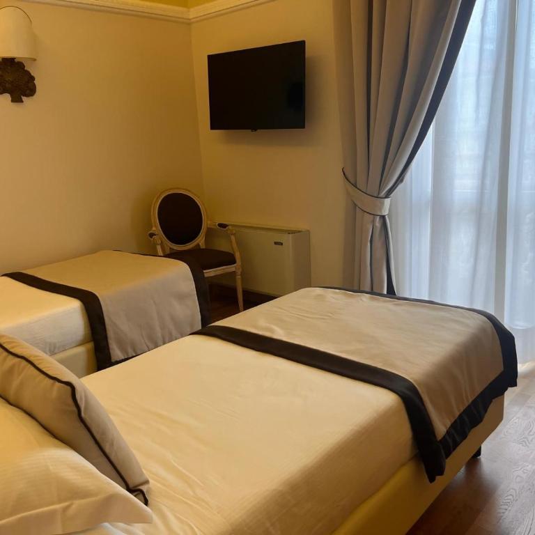 Grand Hotel Vittoria - Camera Doppia con Letti Singoli - 1