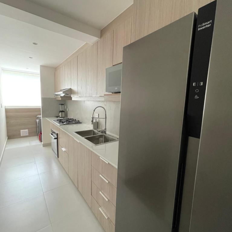 Departamento totalmente amoblado de 3 dormitorios, 2 baños - Apartamento de 3 dormitorios - 16