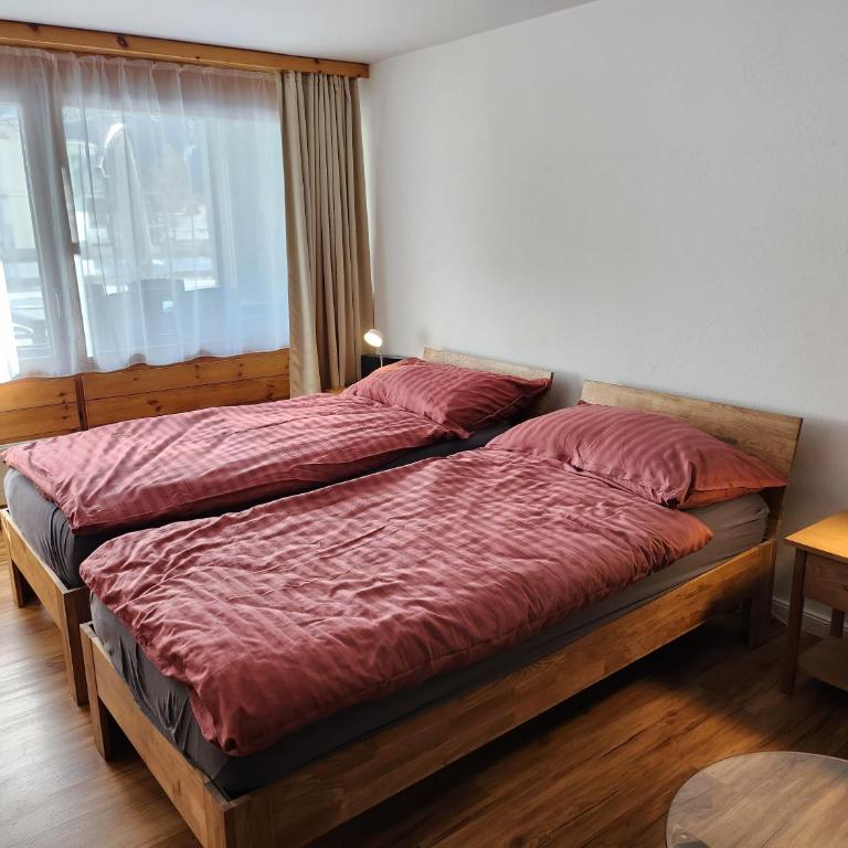Stilvolles und ruhiges Apartment mit privater 60m2 Sonnenterrasse bei der Parsennbahn - Apartment mit 2 Schlafzimmern und Bergblick - 11