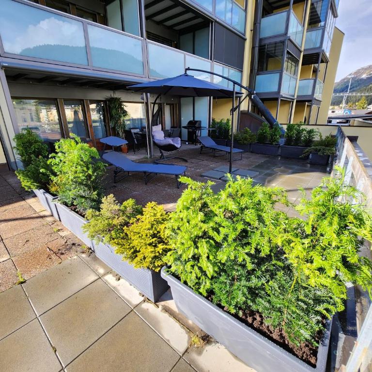 Stilvolles und ruhiges Apartment mit privater 60m2 Sonnenterrasse bei der Parsennbahn - Apartment mit 2 Schlafzimmern und Bergblick - 13