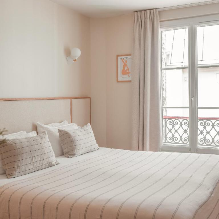 Hôtel BASSS - Grande Chambre Double ou Lits Jumeaux - 4
