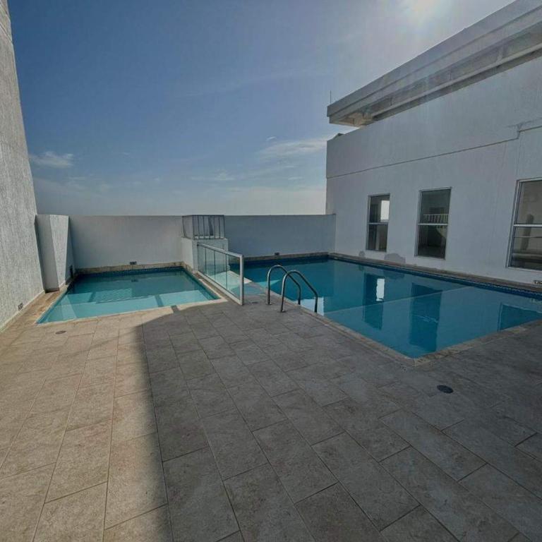 Ocean Breeze 3BR Pool & Balcony by Wellcome - Apartamento - 5