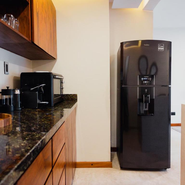 Ha'as Naj Suites Bananas - One-Bedroom Apartment with Pool View - 11