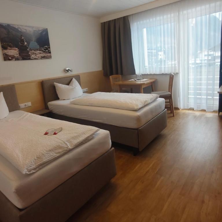 Gästehaus Holaus - Doppelzimmer mit Balkon - 6