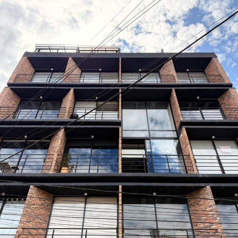 Loft Elegante con Vista a la Ciudad - One-Bedroom Apartment with Balcony and City View - 12