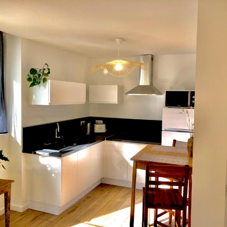 Appartement Tout Confort Coeur de Ville Grand Balcon Le Néouvielle - Apartment mit 1 Schlafzimmer - 4