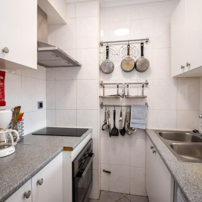 Ref 228 Apartamento de 1 dormitorio con vistas al mar en primera línea de playa en Los Boliches - Apartamento de 1 dormitorio - Frente al océano - 13