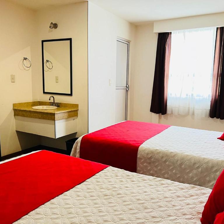 Hotel Arbis - Habitación Doble Estándar con 2 camas dobles - 5