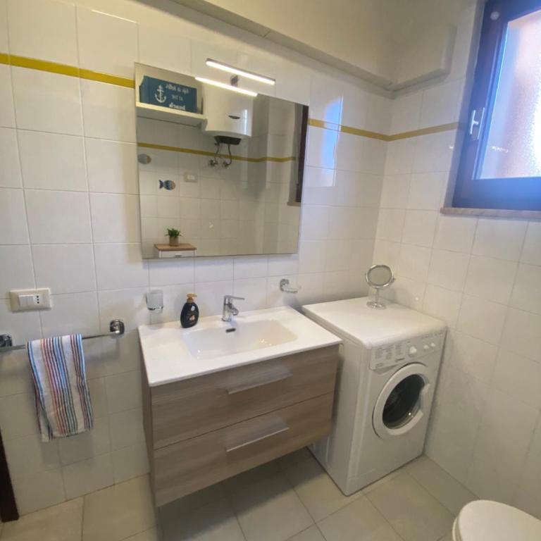 Casa con giardino, Wi-Fi e aria condizionata vicino alla Pelosa - Appartamento con 2 Camere da Letto e Vista Mare - 39