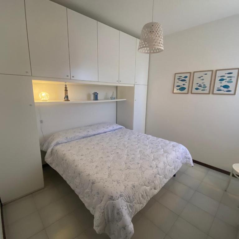 Casa con giardino, Wi-Fi e aria condizionata vicino alla Pelosa - Appartamento con 2 Camere da Letto e Vista Mare - 11