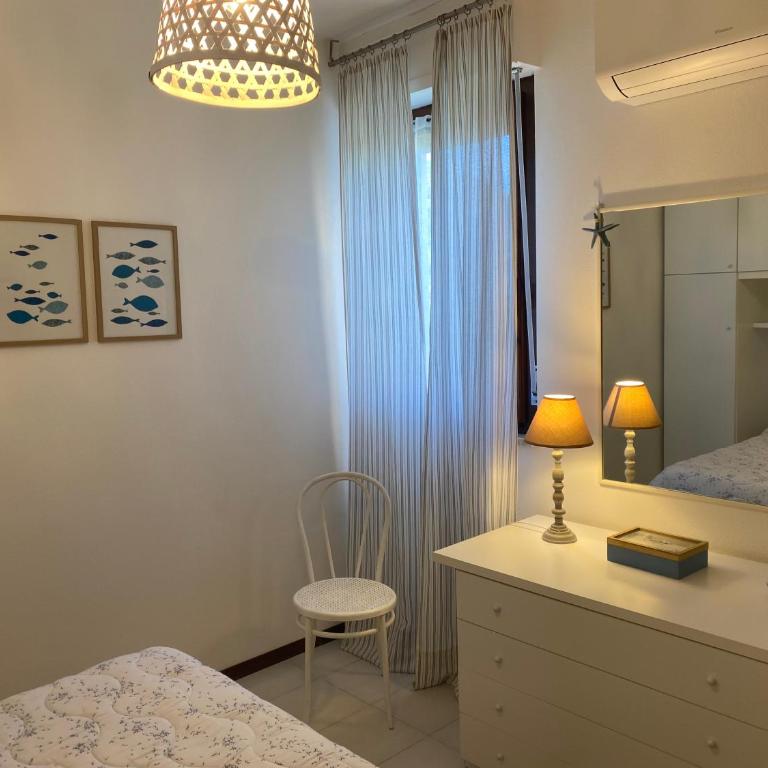 Casa con giardino, Wi-Fi e aria condizionata vicino alla Pelosa - Appartamento con 2 Camere da Letto e Vista Mare - 27