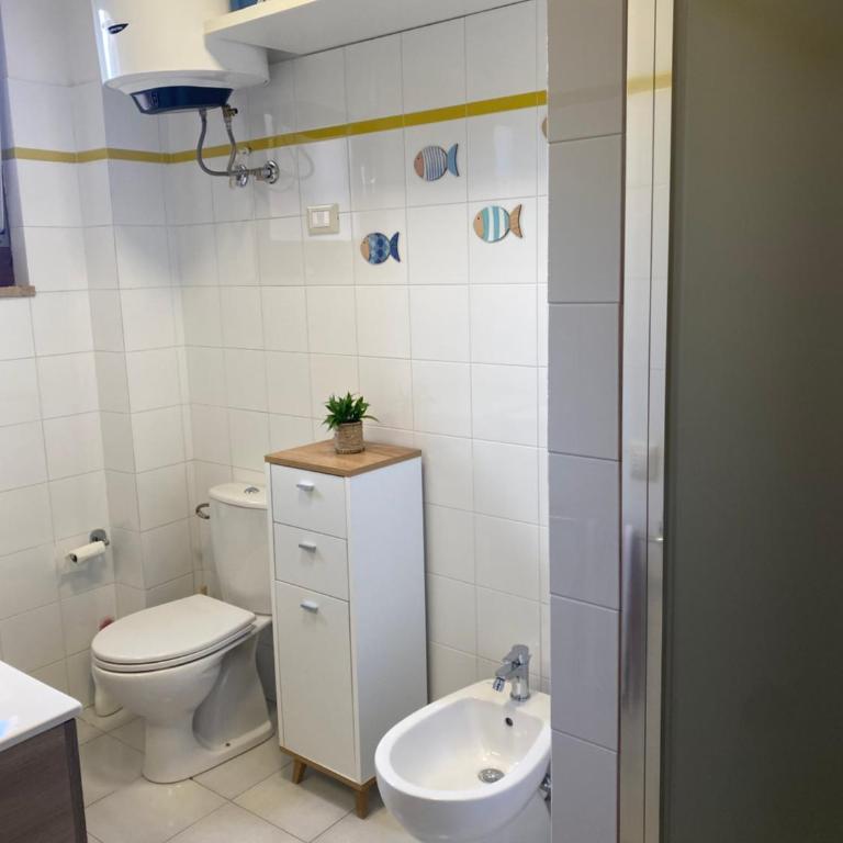 Casa con giardino, Wi-Fi e aria condizionata vicino alla Pelosa - Appartamento con 2 Camere da Letto e Vista Mare - 48