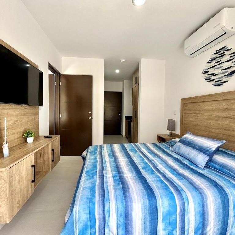 Un Lugar Ideal cerca de la playa by G P S rentas - Three-Bedroom Apartment - 30
