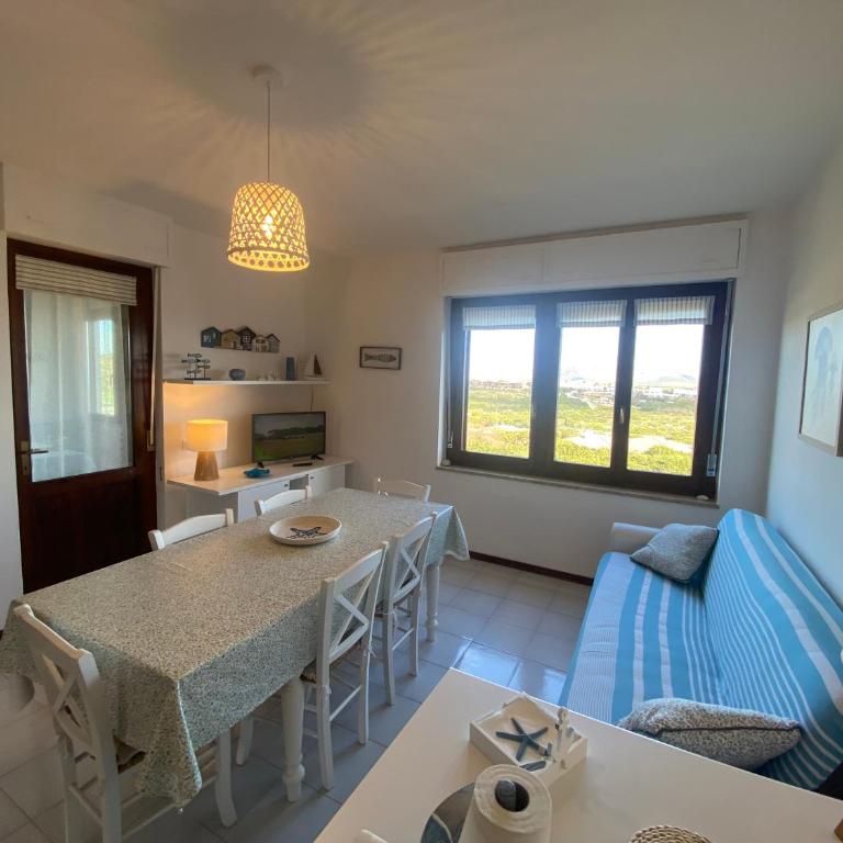 Casa con giardino, Wi-Fi e aria condizionata vicino alla Pelosa - Appartamento con 2 Camere da Letto e Vista Mare - 7