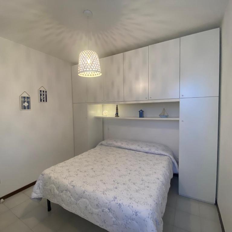 Casa con giardino, Wi-Fi e aria condizionata vicino alla Pelosa - Appartamento con 2 Camere da Letto e Vista Mare - 17