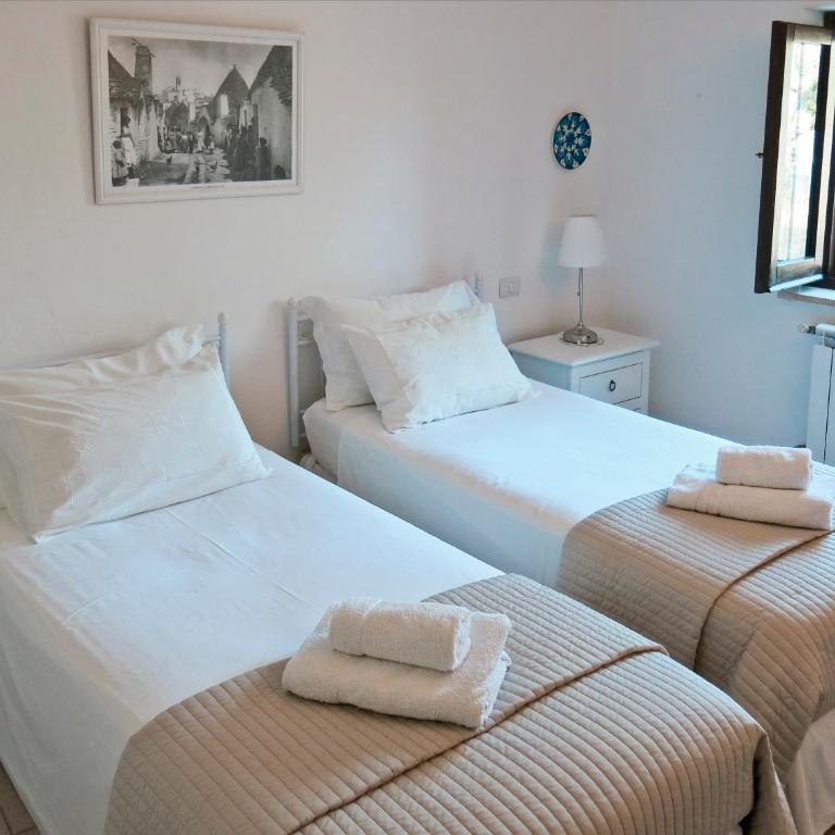 Trullo Olivia con piscina riscaldata, natura e relax - Three-Bedroom House - 38