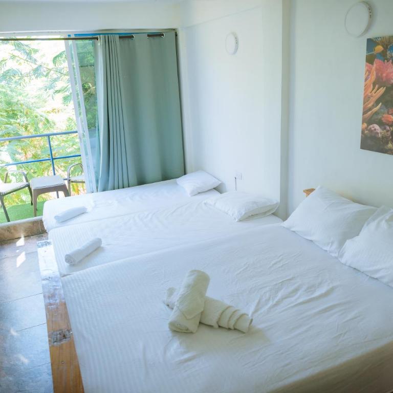 Hostal PerlaNegra Tierra Bomba - Habitación Familiar - 11