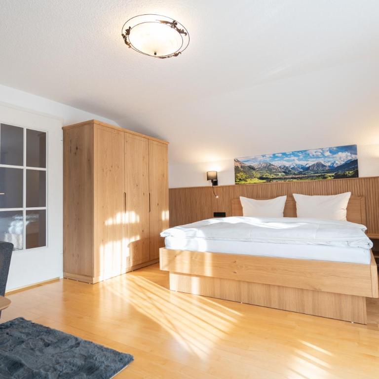 Gästehaus Birkenhof - Apartment mit 3 Schlafzimmern und Bergblick - 10
