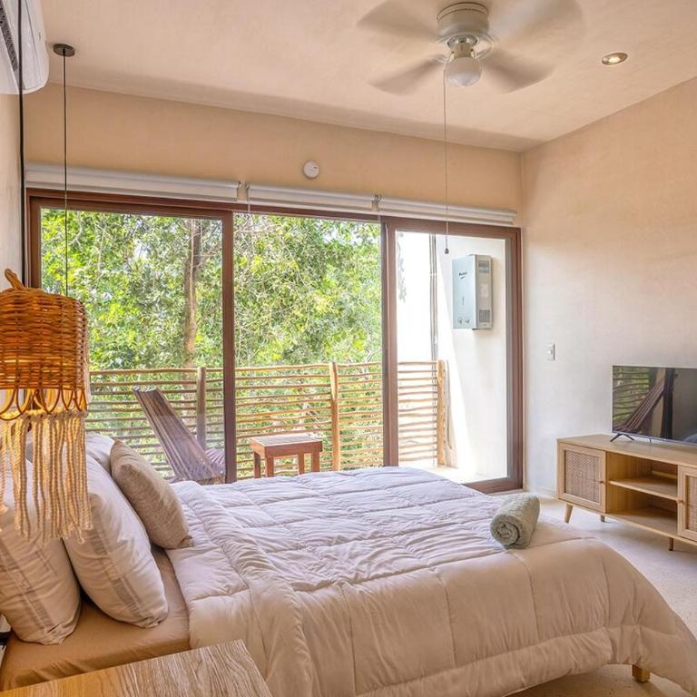 Lujoso Departamento con Amenidades en Nim Selva Norte Tulum - Two-Bedroom Apartment - 40