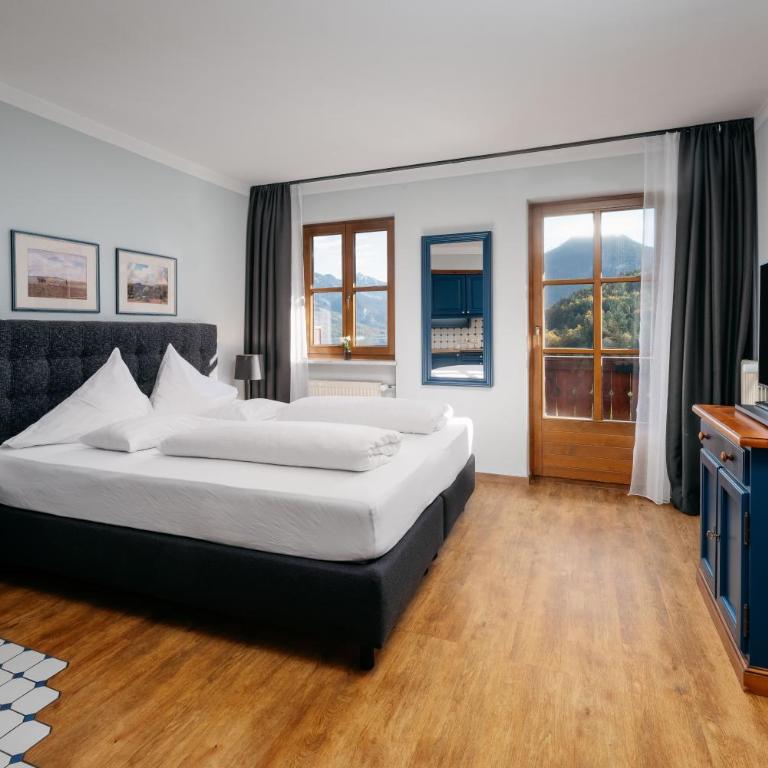 MONDI Appartements am Grundlsee - Doppelzimmer mit Seeblick - 5