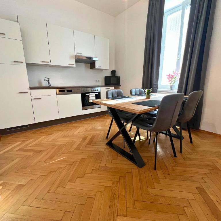 Leoben City Apartments - Premium Apartments 24 7 - Camera Doppia con Letti Singoli con Vista Giardino - 7