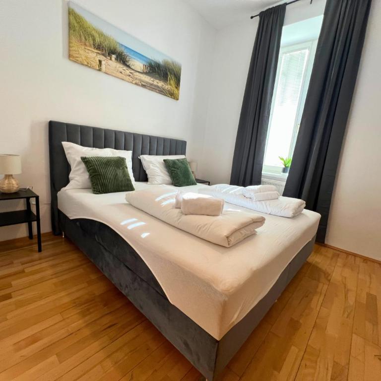 Leoben City Apartments - Premium Apartments 24 7 - Camera Doppia con Letti Singoli con Vista Giardino - 11
