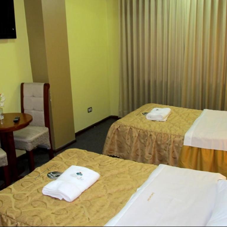 Grand Cesars Hotel - Habitación Doble con baño privado - 2 camas - 5