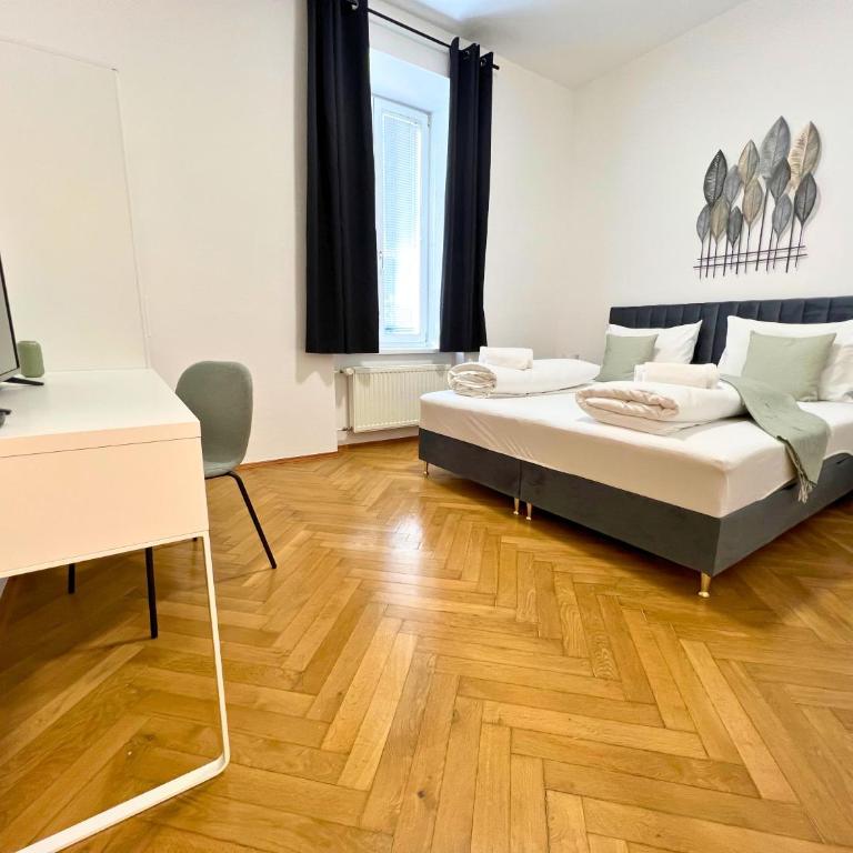 Leoben City Apartments - Premium Apartments 24 7 - Camera Doppia con Letti Singoli con Vista Giardino - 9