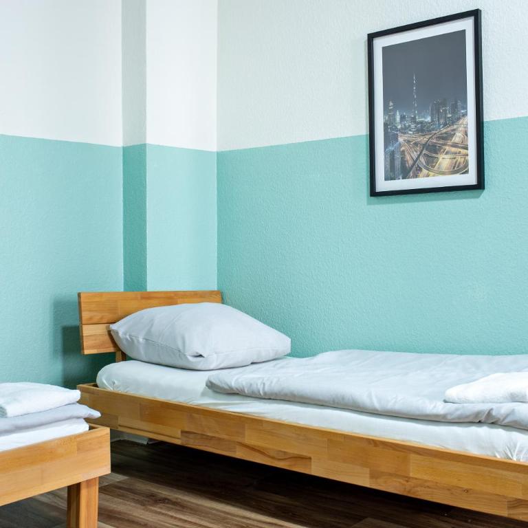 Schwanthaler Hof - Dreibettzimmer mit Gemeinschaftsbad - 16